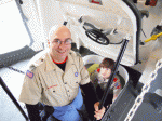 Roy Evan (left) and his son, John Evan, explore one of the ships on the Troop’s weekend adventure in Buffalo.
