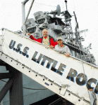 ALL HANDS ON DECK: Bob Granchie (left) and his son, Bobby, board the U.S.S. Little Rock on Troop 101’s weekend adventure.