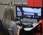 Students try out distracted driving simulator